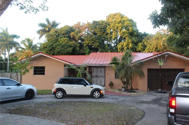a car parked in front of a house