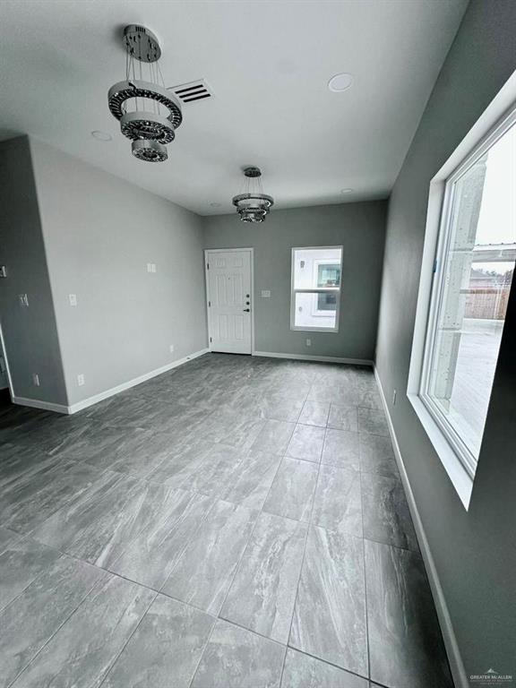 3800 Robin Street, Unit 2 Pharr, TX 78577 - Photo 17 of 18 a view of an empty room and a window