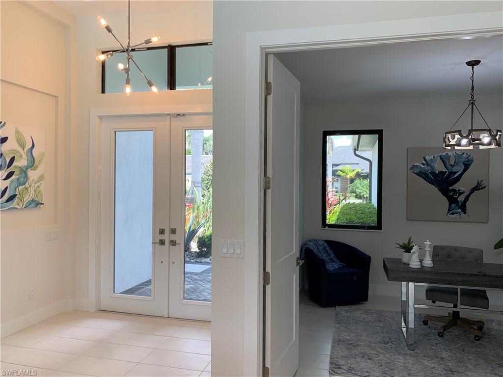 214 Legacy Court Naples, FL 34110 - Photo 11 of 49 Foyer Twinkles