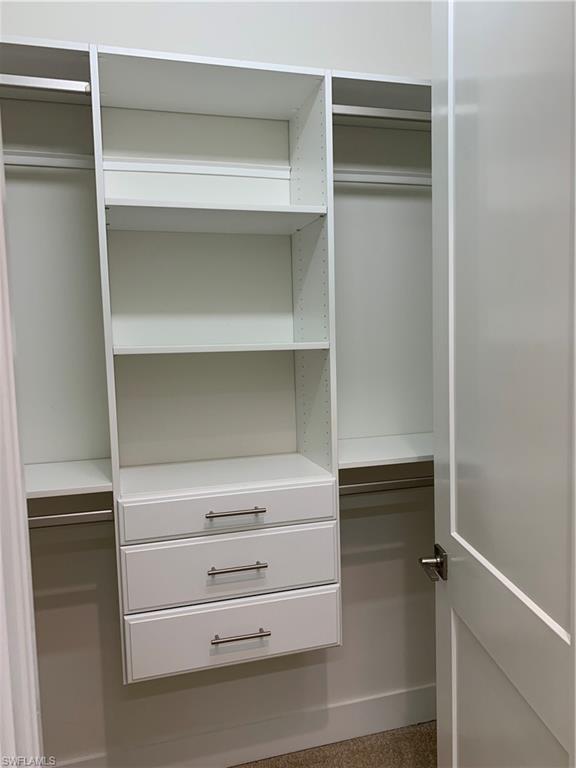 214 Legacy Court Naples, FL 34110 - Photo 24 of 49 TWO Walk IN Closets for Master Bedroom with Built in Systems