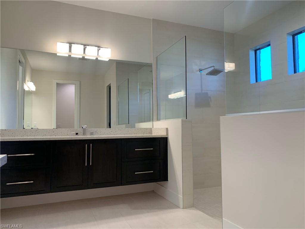 214 Legacy Court Naples, FL 34110 - Photo 27 of 49 Master Bath Vanity 2: HIS