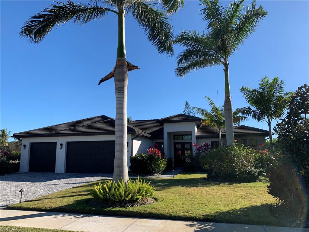 214 Legacy Court Naples, FL 34110 - Photo 3 of 49 THREE Car garage, AND 3 car WIDE DRIVEWAY!!!