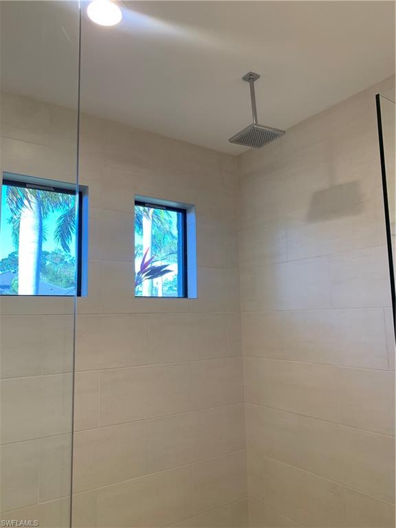 214 Legacy Court Naples, FL 34110 - Photo 31 of 49 a window in an empty room