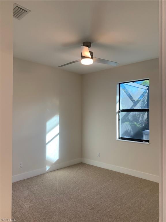 214 Legacy Court Naples, FL 34110 - Photo 34 of 49 an empty room with windows