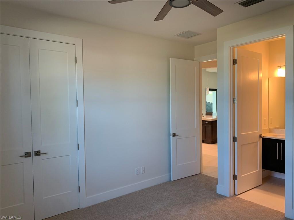 214 Legacy Court Naples, FL 34110 - Photo 35 of 49 Guest Bedroom #3 with Ensuite Bath.