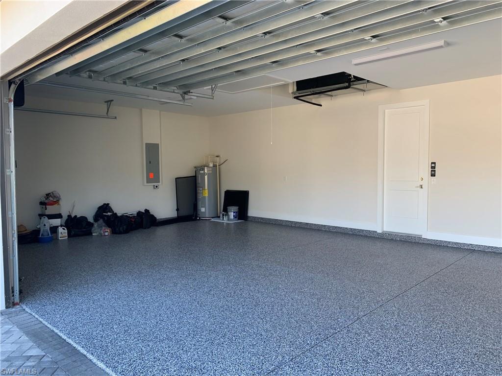 214 Legacy Court Naples, FL 34110 - Photo 41 of 49 a view of room with gym equipment