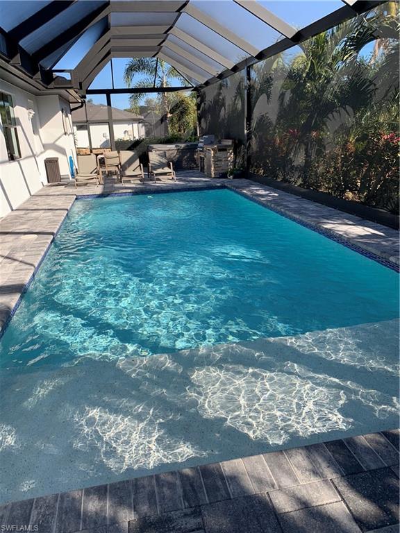 214 Legacy Court Naples, FL 34110 - Photo 8 of 49 A huge Sun Shelf in a lush, private setting.