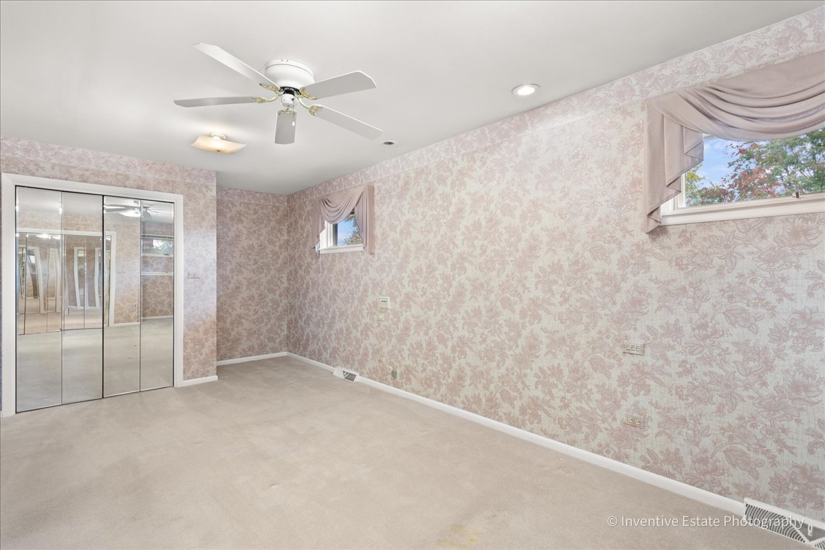 814 Saylor Avenue Elmhurst, IL 60126 - Photo 15 of 35 wooden floor in an empty room with a window