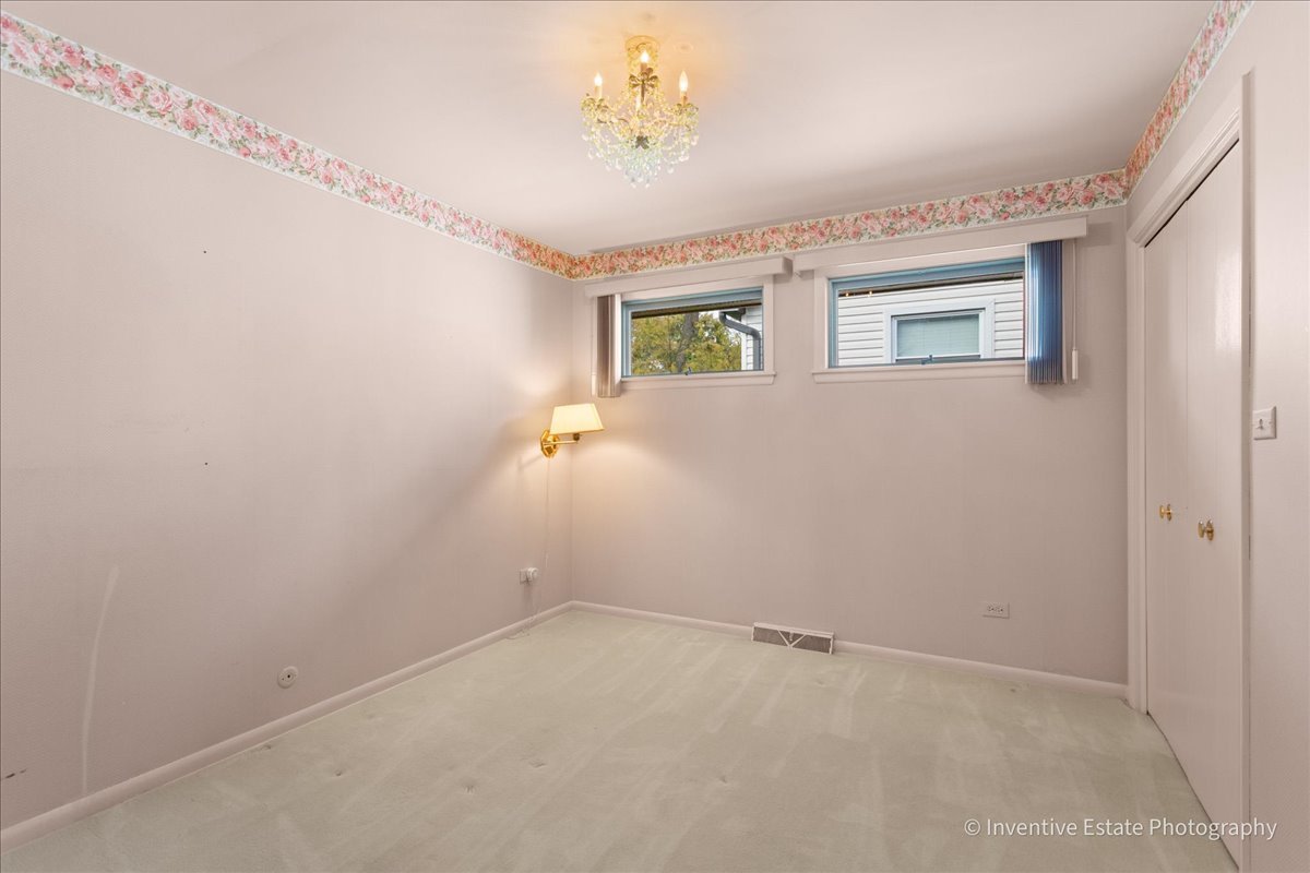 814 Saylor Avenue Elmhurst, IL 60126 - Photo 20 of 35 a view of storage and utility room with windows