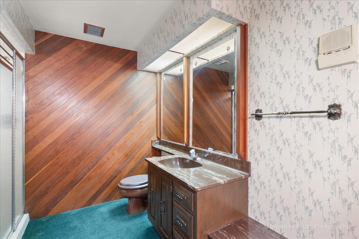 814 Saylor Avenue Elmhurst, IL 60126 - Photo 23 of 35 a bathroom with a granite countertop sink toilet and shower