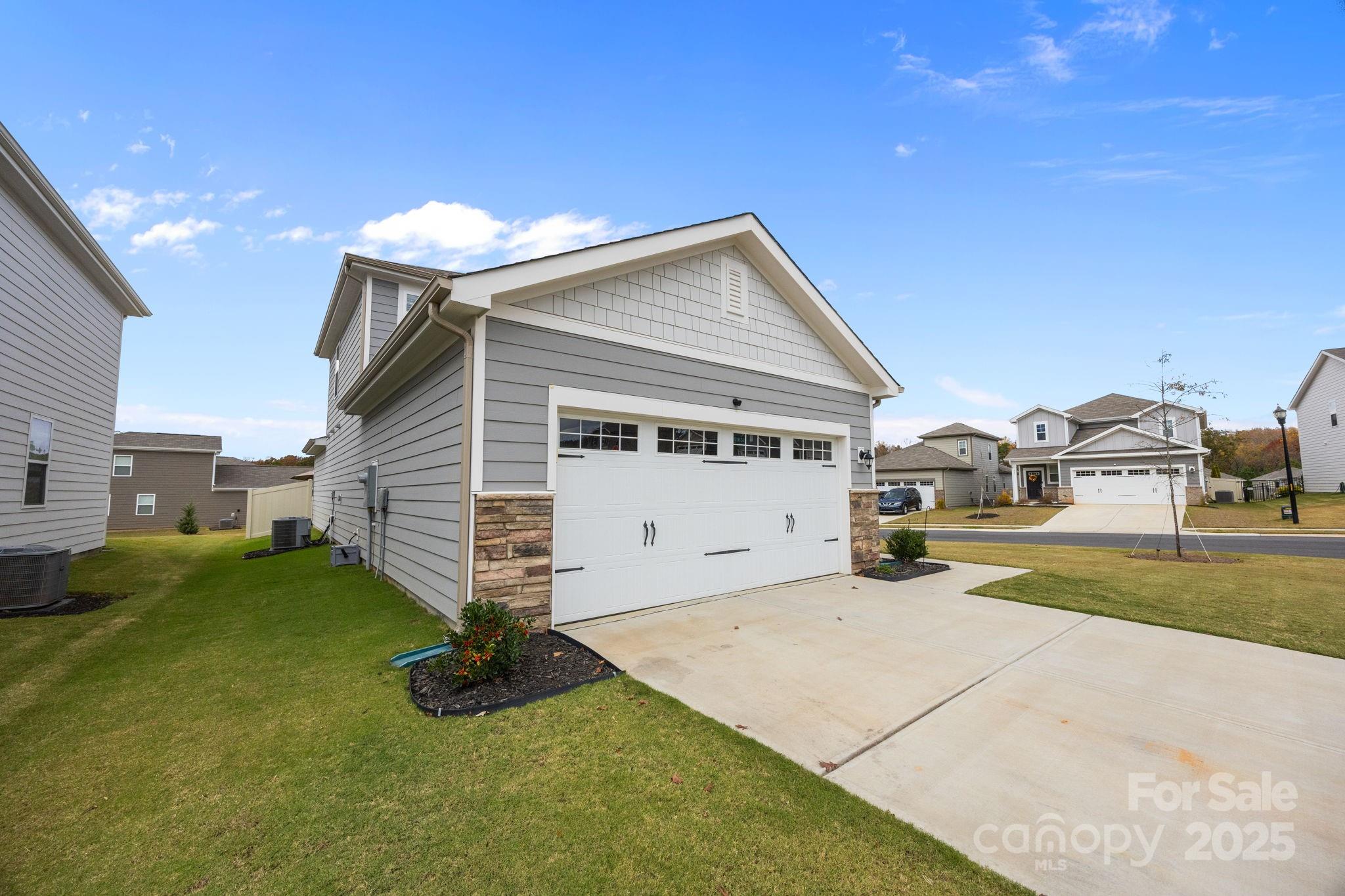 567 Sitka Drive York, SC 29745 - Photo 2 of 40 a front view of a house with a yard