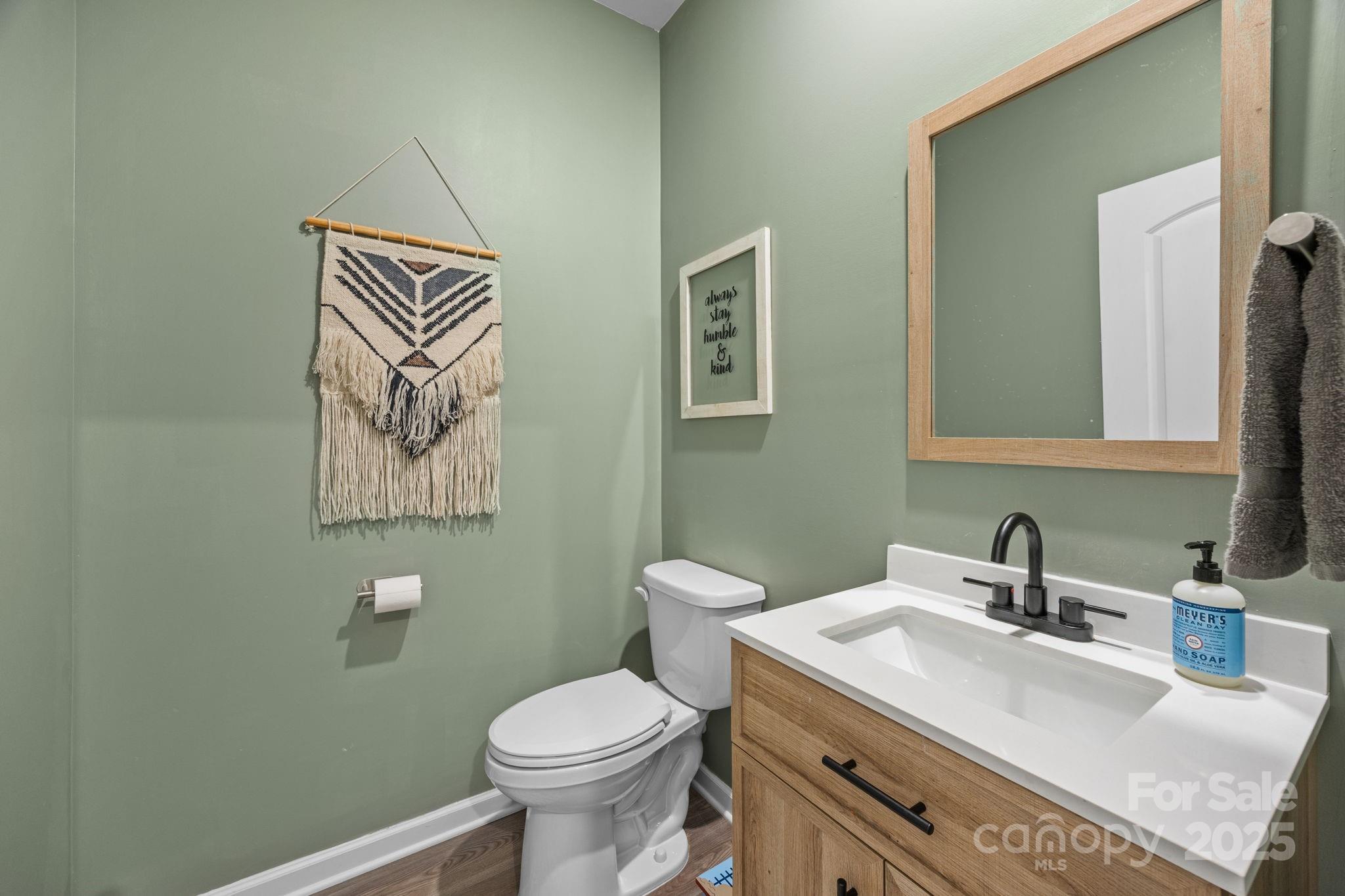 567 Sitka Drive York, SC 29745 - Photo 22 of 40 a bathroom with a toilet sink and mirror