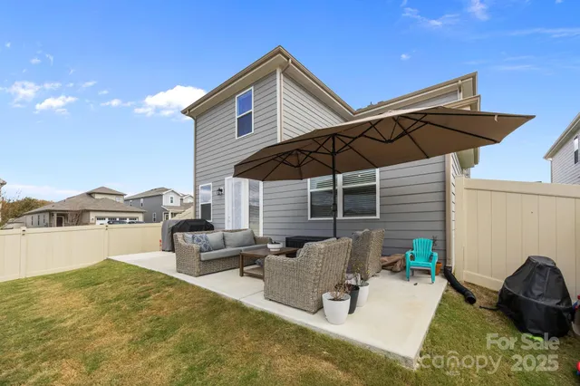 a view of swimming pool with patio