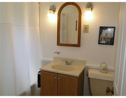 16 Belgium Hill Road Cecil, PA 15321 - Photo 11 of 18 a bathroom with a sink and a mirror