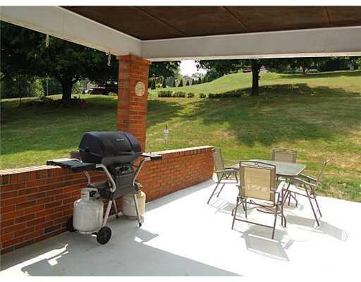 16 Belgium Hill Road Cecil, PA 15321 - Photo 15 of 18 a view of a swimming pool and lounge chair