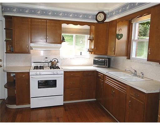 16 Belgium Hill Road Cecil, PA 15321 - Photo 6 of 18 a kitchen with a stove and a sink