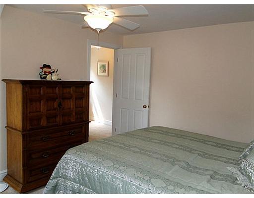 16 Belgium Hill Road Cecil, PA 15321 - Photo 9 of 18 a bedroom with a bed and a dresser
