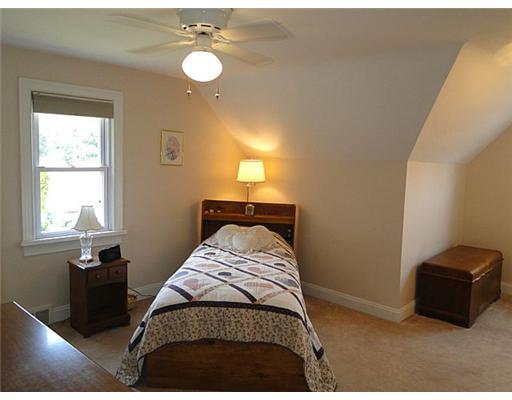 16 Belgium Hill Road Cecil, PA 15321 - Photo 10 of 18 a bedroom with a bed and a chandelier