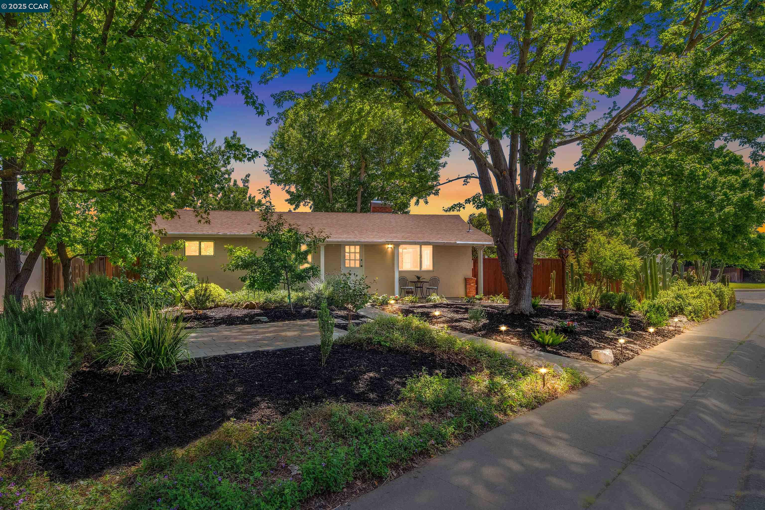 701 Duke Circle Pleasant Hill, CA 94523 - Photo 1 of 1 a front view of a house with garden