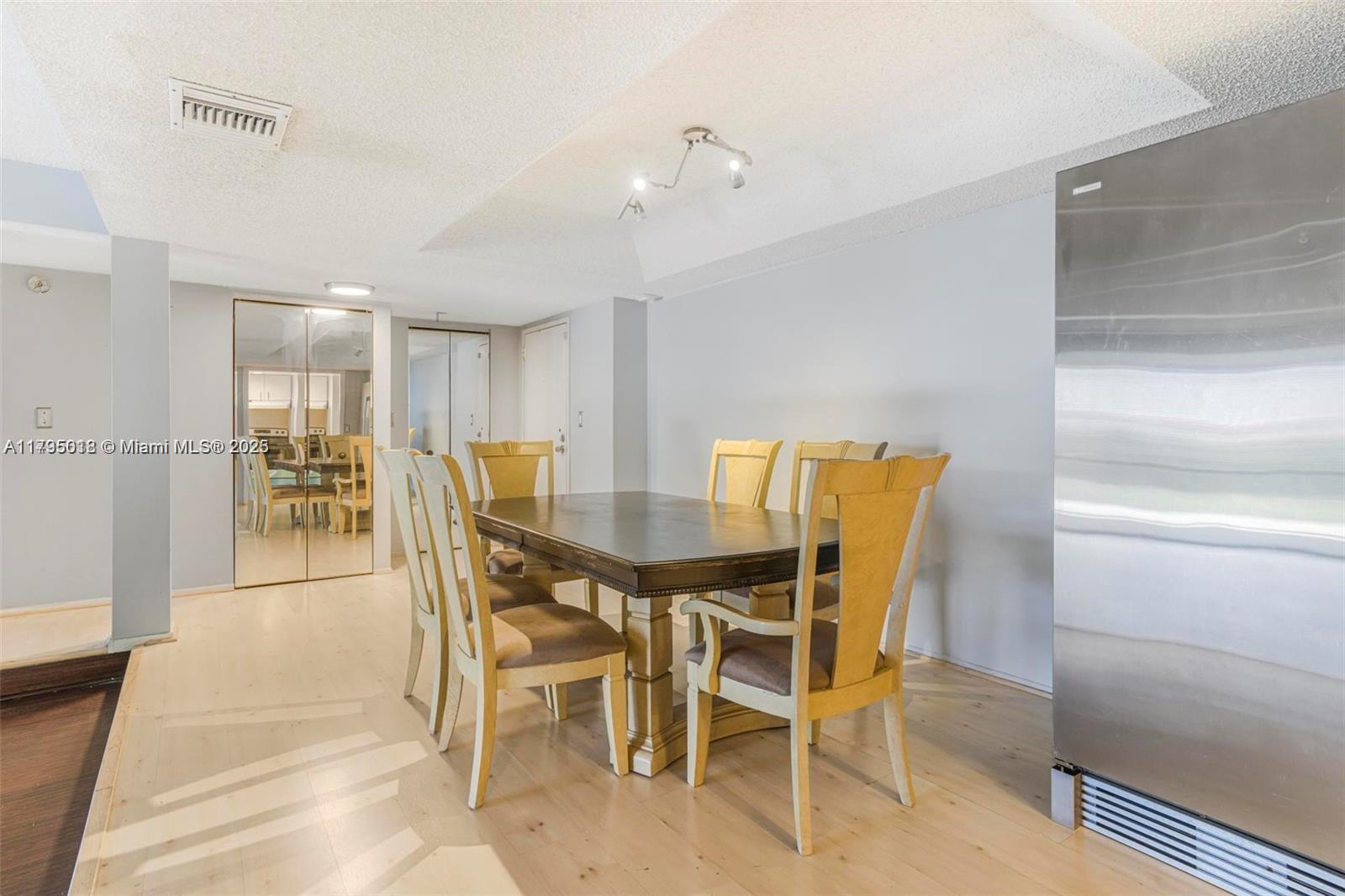 3650 Inverrary Drive, Unit 3P Lauderhill, FL 33319 - Photo 7 of 40 a view of a dining room with furniture