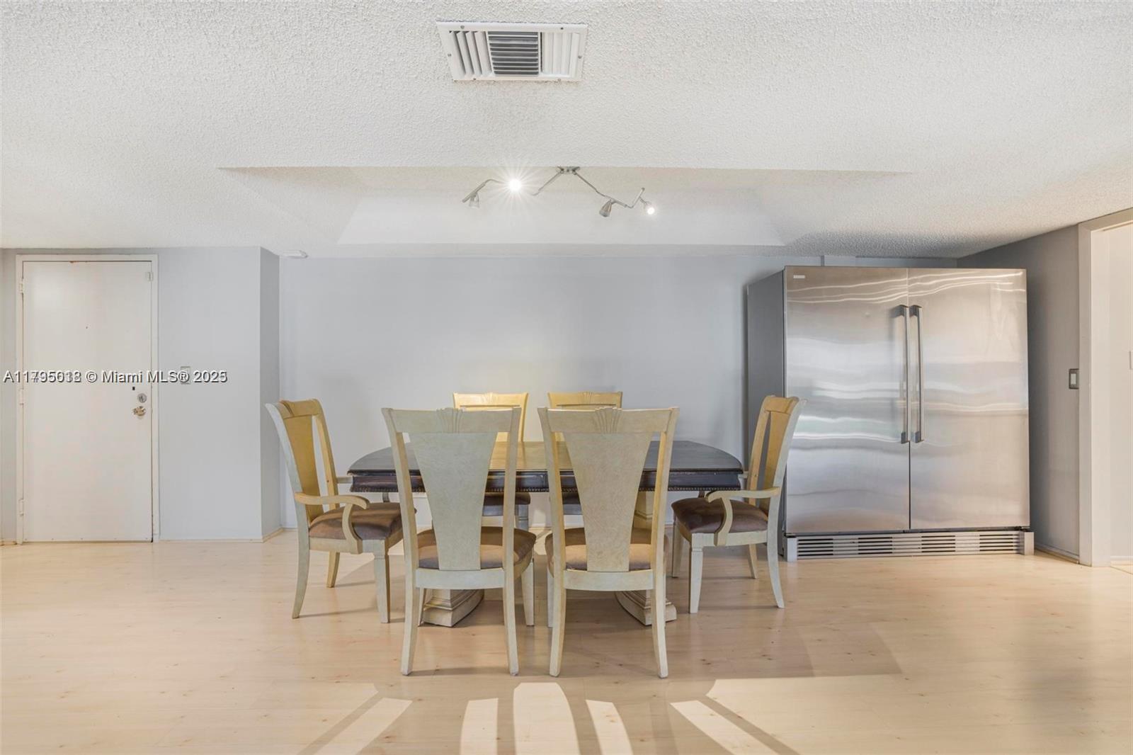 3650 Inverrary Drive, Unit 3P Lauderhill, FL 33319 - Photo 8 of 40 a view of a dining room with furniture