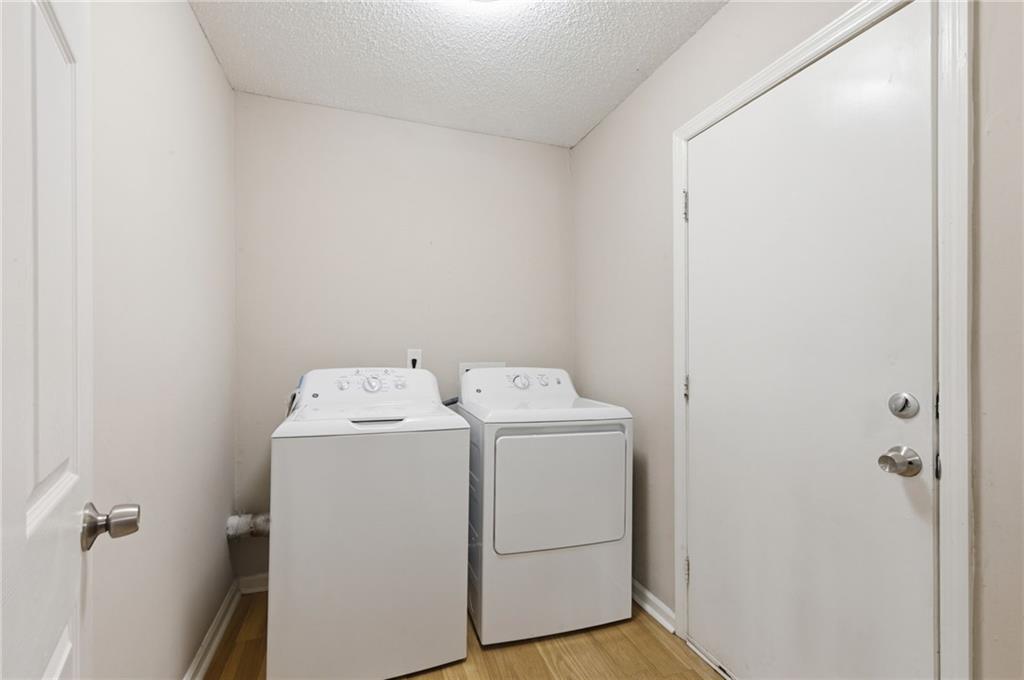 5017 Sandyhook Court Northwest Acworth, GA 30102 - Photo 23 of 43 a utility room with dryer and washer