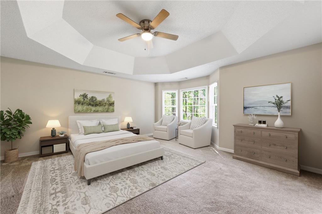 5017 Sandyhook Court Northwest Acworth, GA 30102 - Photo 28 of 43 a bedroom with a large bed and a couch