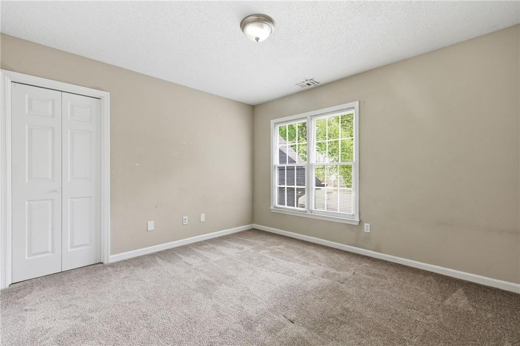 5017 Sandyhook Court Northwest Acworth, GA 30102 - Photo 34 of 43 a view of an empty room with a window
