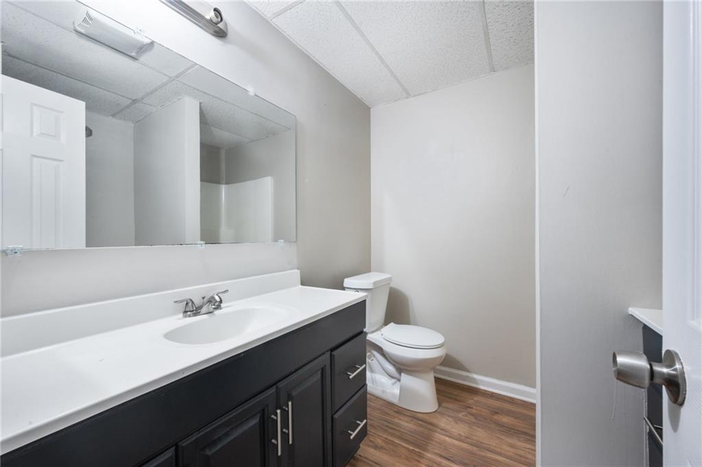 5017 Sandyhook Court Northwest Acworth, GA 30102 - Photo 41 of 43 a bathroom with a sink and a mirror