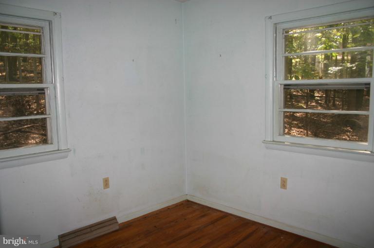 98 Highview Road Harpers Ferry, WV 25425 - Photo 8 of 11 a view of a small space with wooden floor and a window