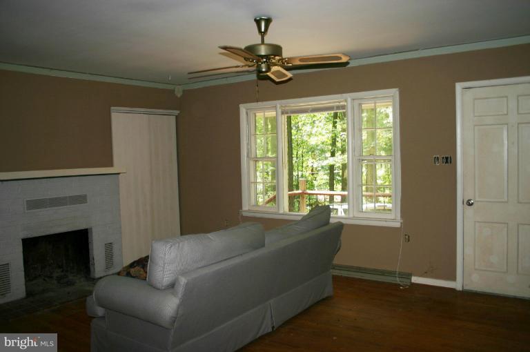 98 Highview Road Harpers Ferry, WV 25425 - Photo 9 of 11 a living room with furniture and a window