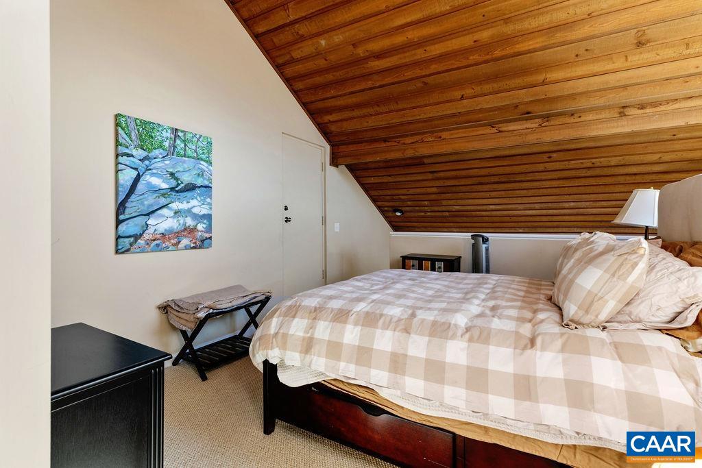 1469 The Ledges Roseland, VA 22967 - Photo 15 of 35 a bedroom with a bed and a desk