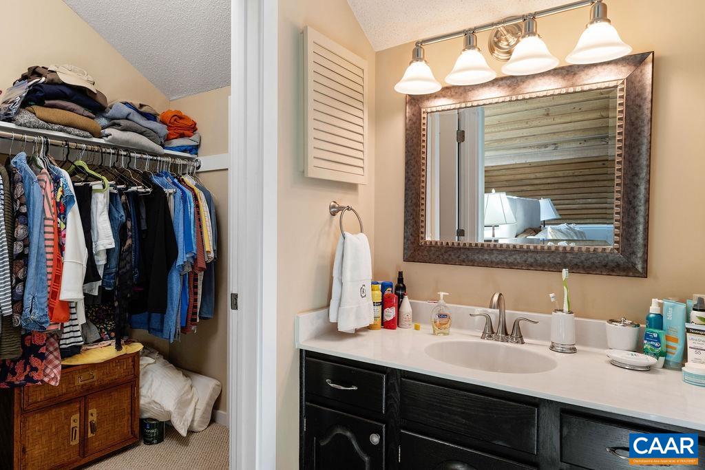 1469 The Ledges Roseland, VA 22967 - Photo 18 of 35 a view of bathroom with a sink and mirror