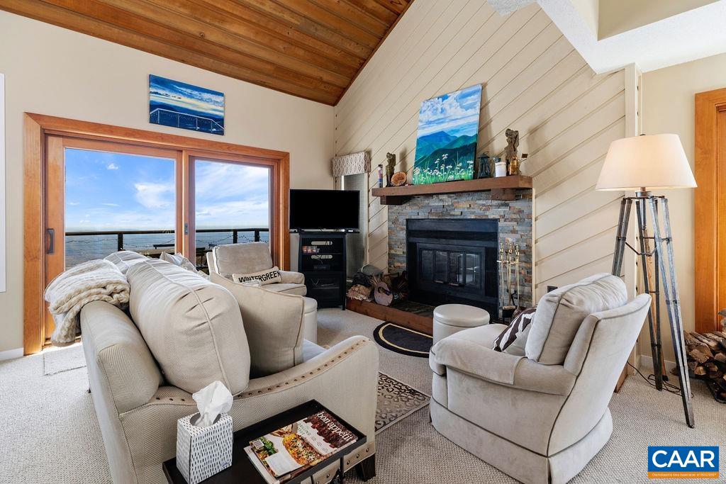 1469 The Ledges Roseland, VA 22967 - Photo 3 of 35 a living room with furniture fireplace and a flat screen tv