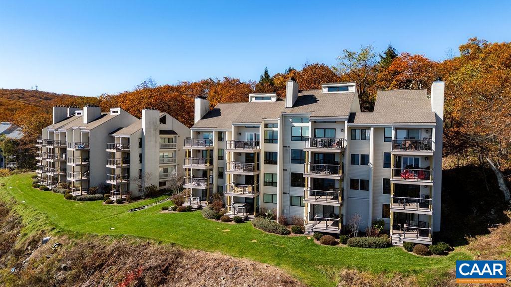 1469 The Ledges Roseland, VA 22967 - Photo 32 of 35 a view of multiple houses with a big yard and large trees