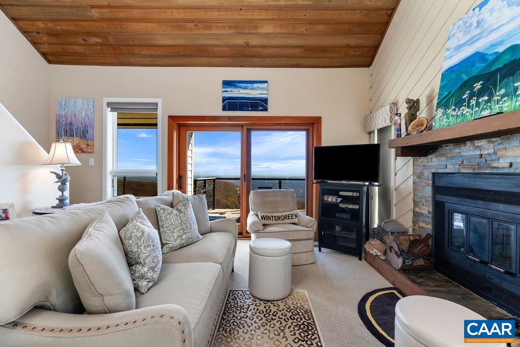 1469 The Ledges Roseland, VA 22967 - Photo 5 of 35 a living room with furniture and a fireplace
