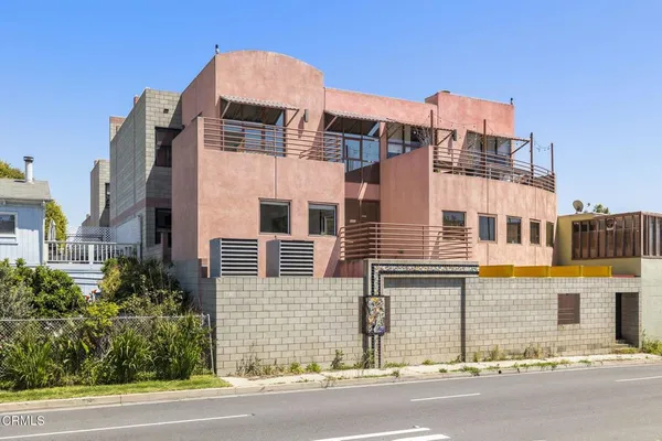 a view of a building with a street