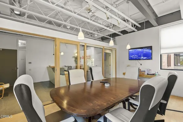 a view of a dining room with furniture