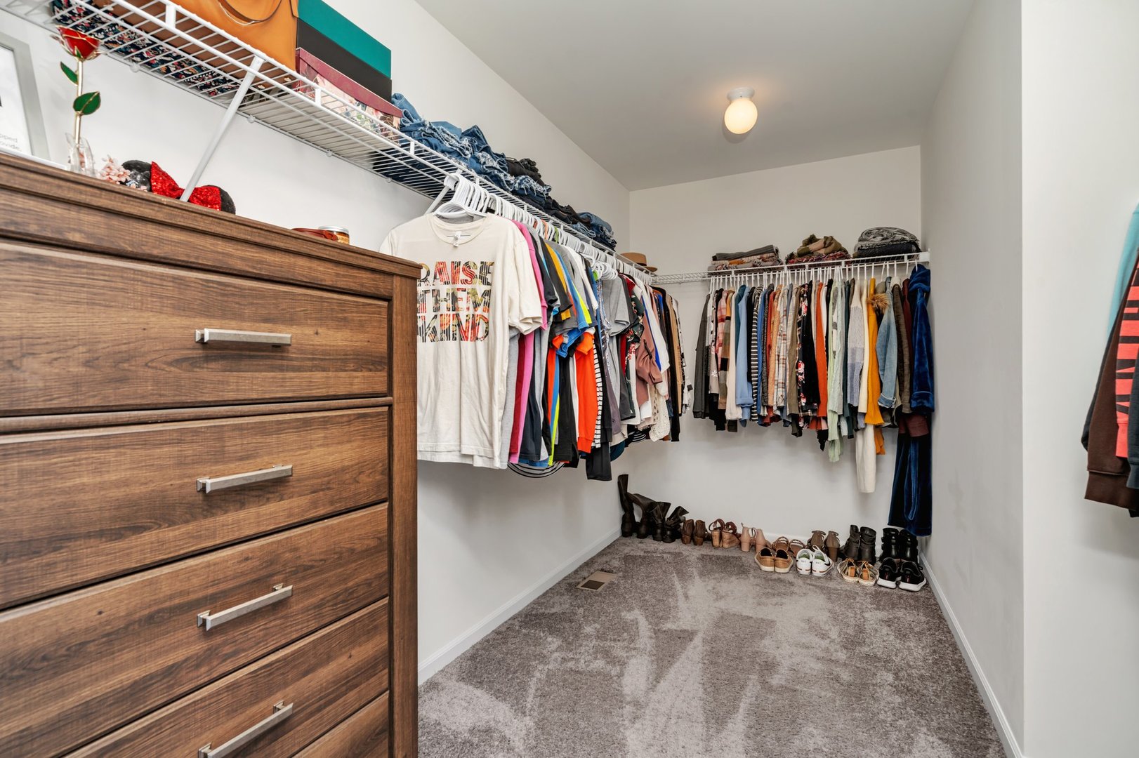 1901 Locust Road Morris, IL 60450 - Photo 18 of 30 a view of walk in closet with clothes