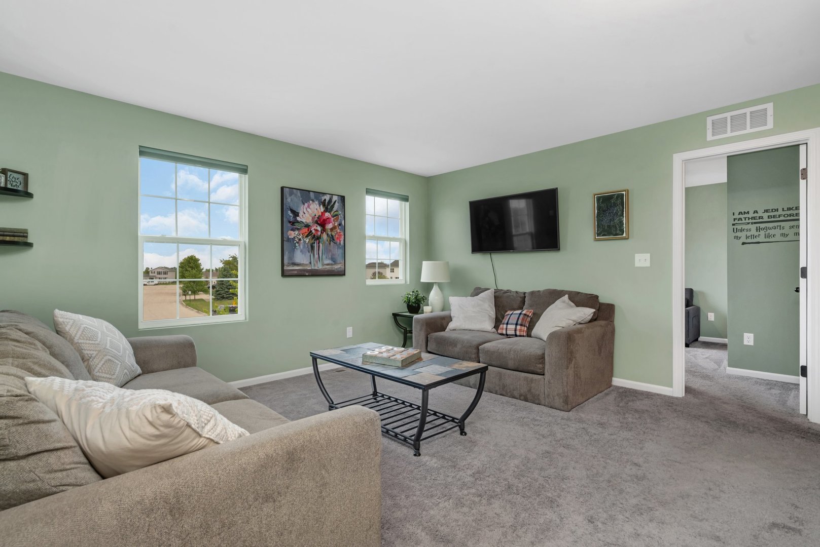 1901 Locust Road Morris, IL 60450 - Photo 20 of 30 a living room with furniture and a flat screen tv