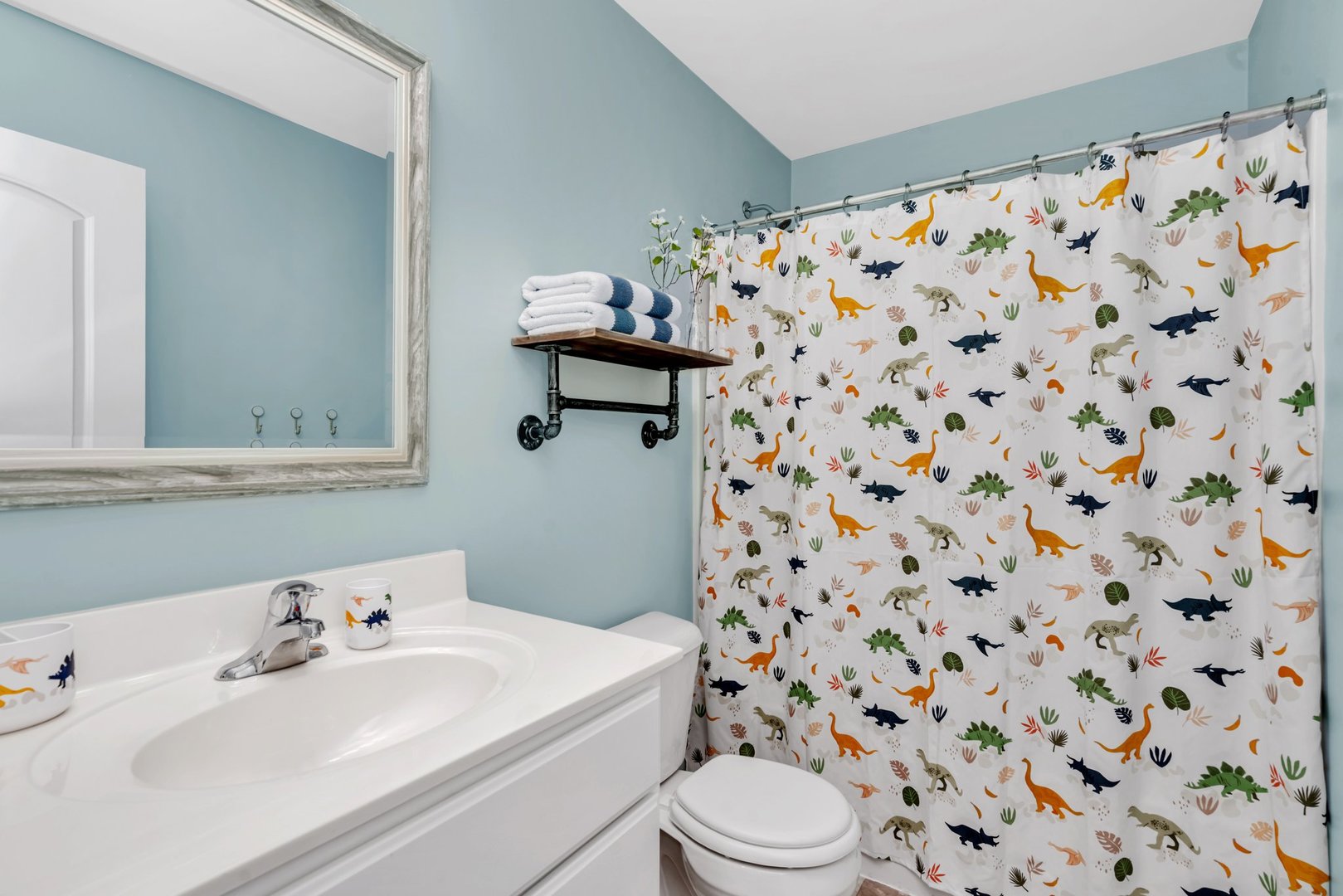 1901 Locust Road Morris, IL 60450 - Photo 24 of 30 a bathroom with a sink a toilet and shower curtain
