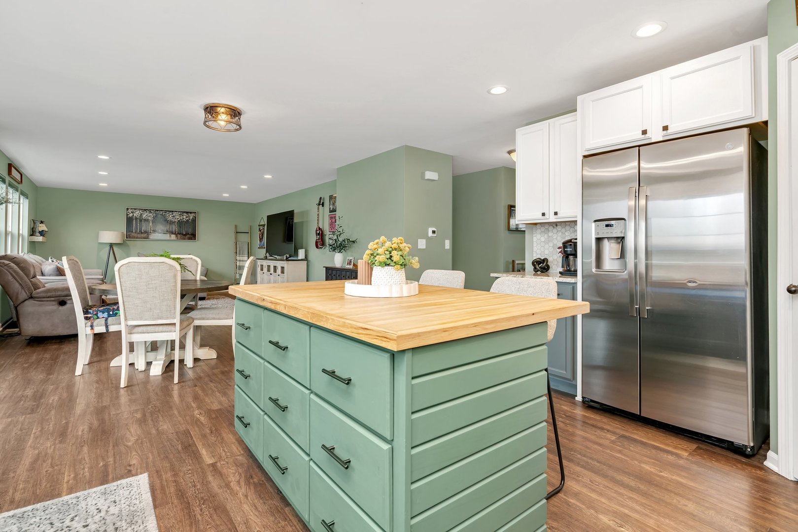 1901 Locust Road Morris, IL 60450 - Photo 6 of 30 a kitchen with stainless steel appliances kitchen island granite countertop a table chairs and a refrigerator