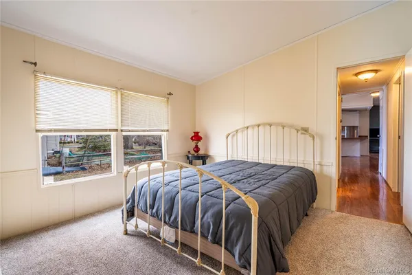 a view of balcony with wooden floor and fence
