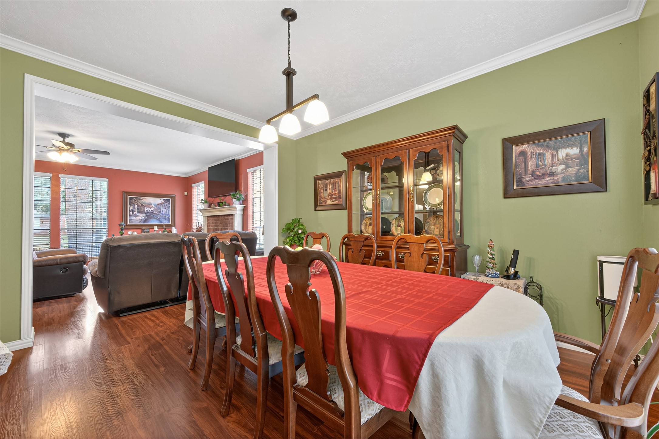 17215 Chaseloch Street Spring, TX 77379 - Photo 12 of 32 a view of a dining room with furniture window and wooden floor