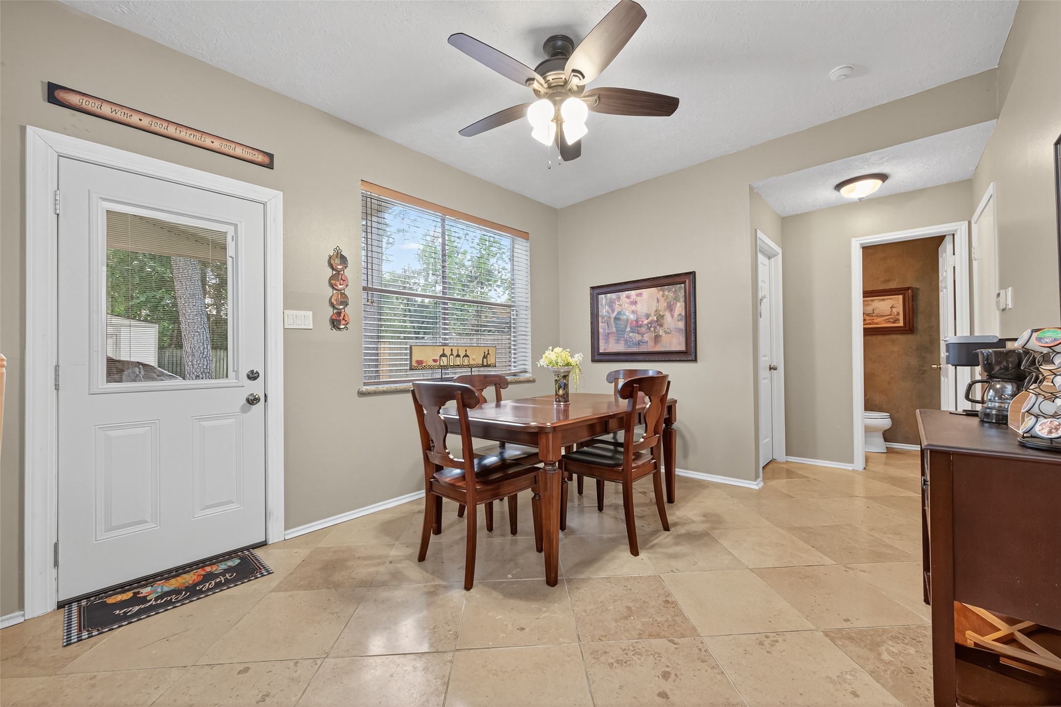 17215 Chaseloch Street Spring, TX 77379 - Photo 18 of 32 a view of a dining room with furniture and a window