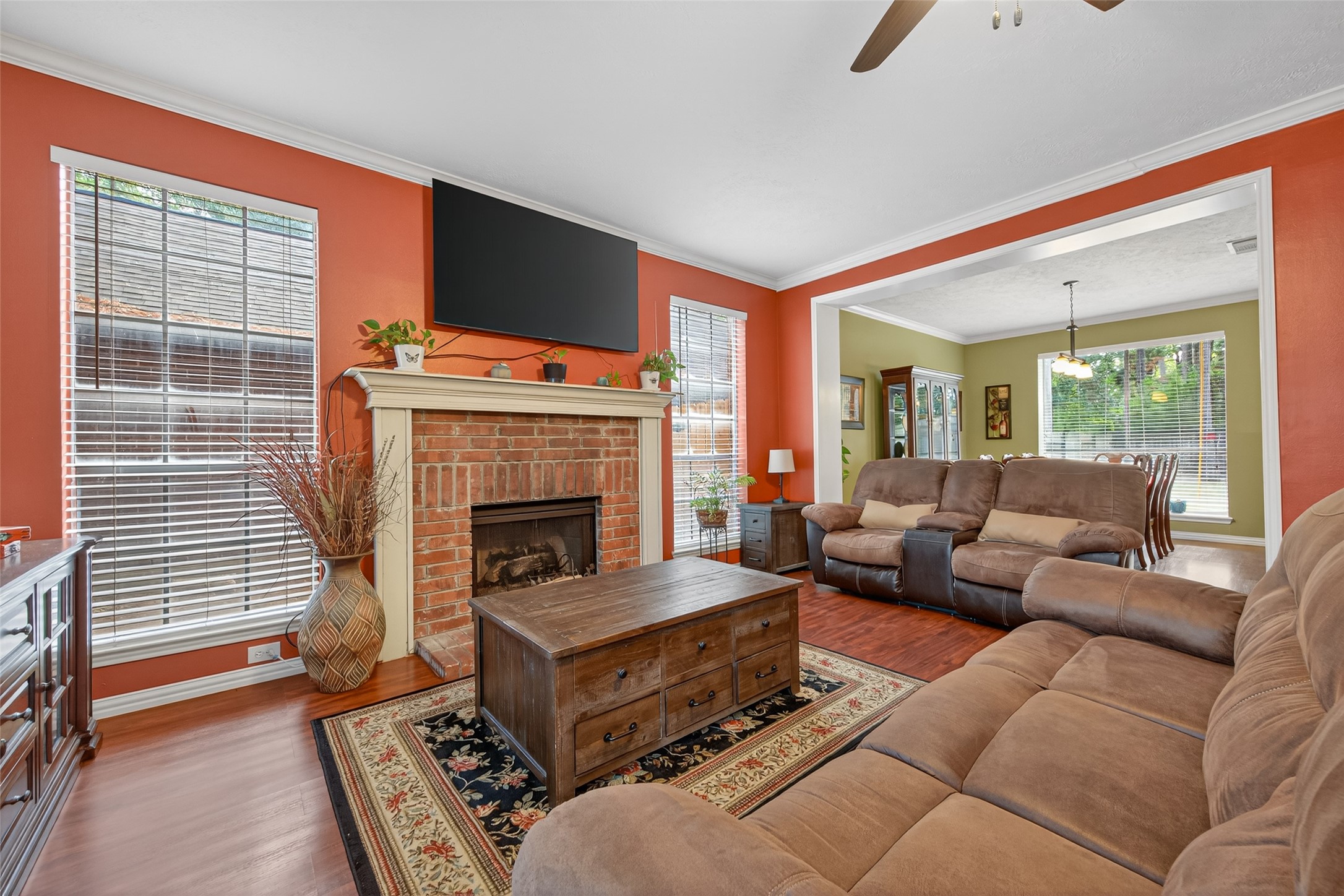 17215 Chaseloch Street Spring, TX 77379 - Photo 6 of 32 a living room with furniture and a fireplace