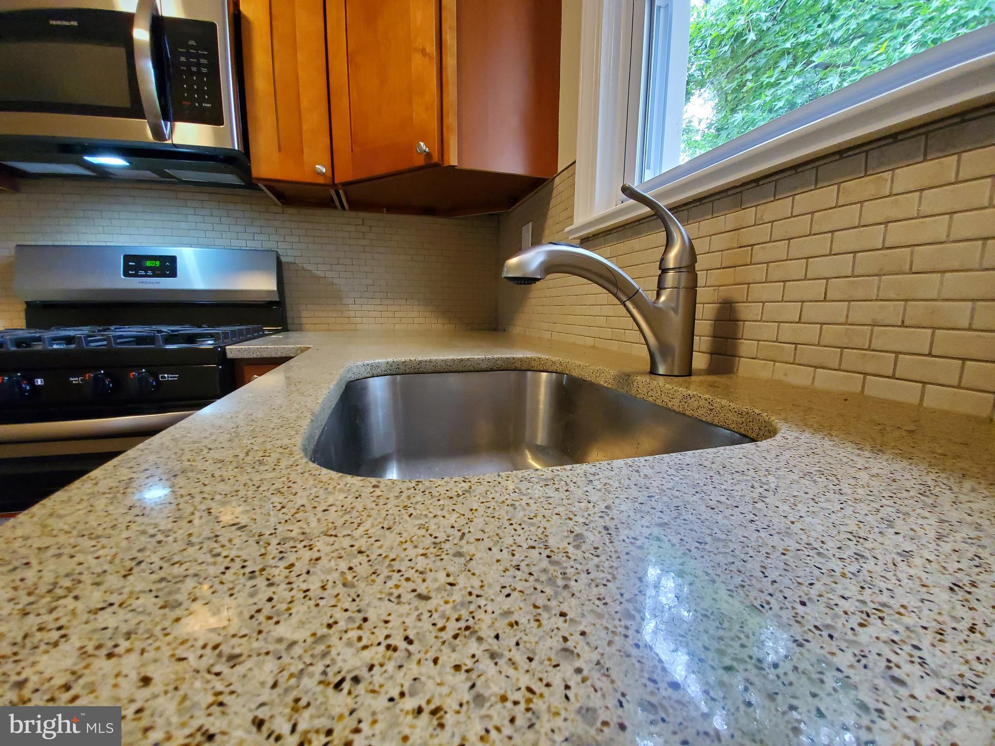 16 Wayne Road Bridgeton, NJ 08302 - Photo 9 of 37 Granite Countertops and tile backsplash