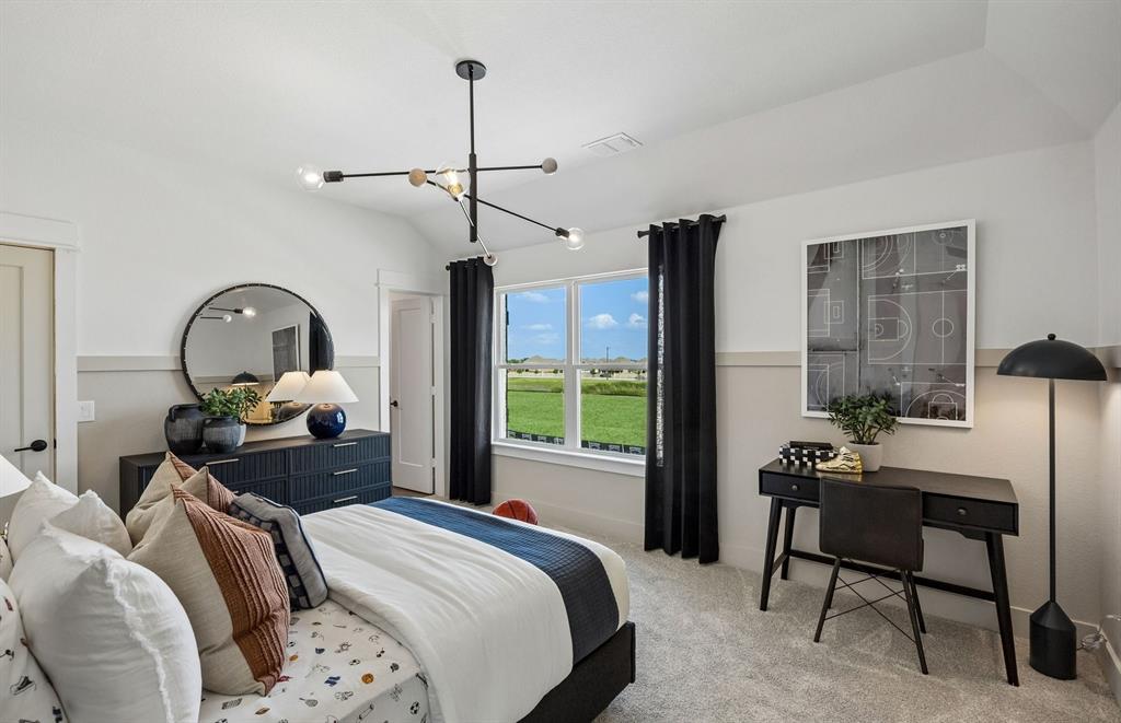 4728 Ripley Court Celina, TX 75009 - Photo 15 of 19 *Model Representation - Spacious secondary bedroom with large windows