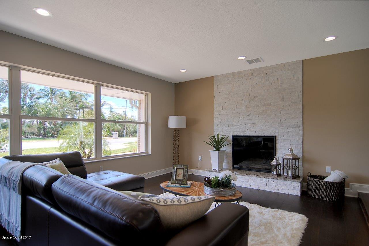 2199 North Riverside Drive Indialantic, FL 32903 - Photo 4 of 21 Living w/stacked stone fireplace