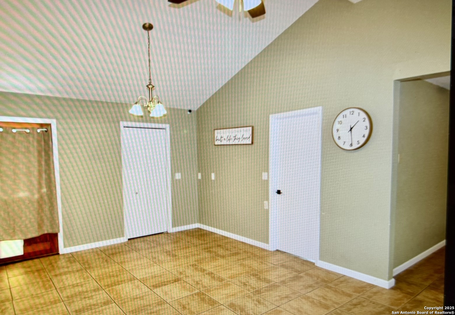 315 Mockingbird Lane Devine, TX 78016 - Photo 4 of 13 a view of an empty room with window